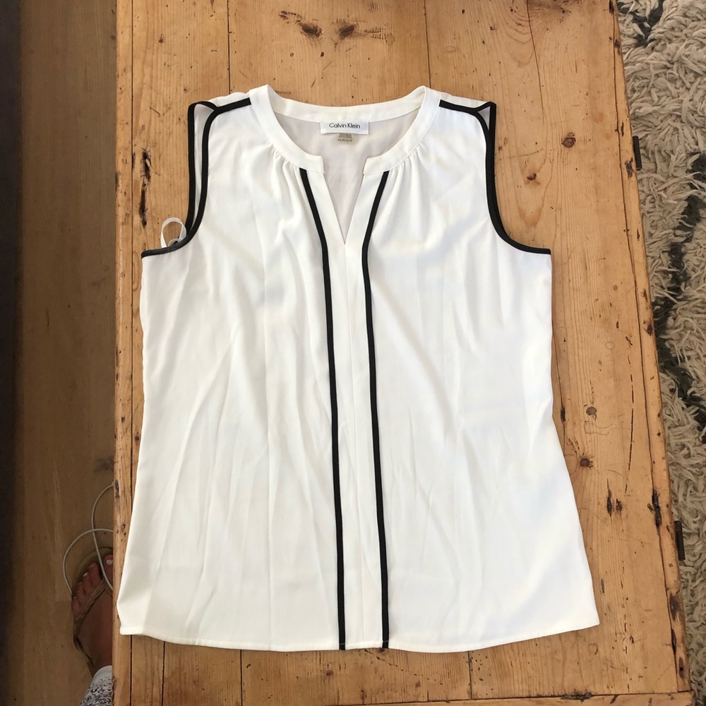 White silky tank with black accents